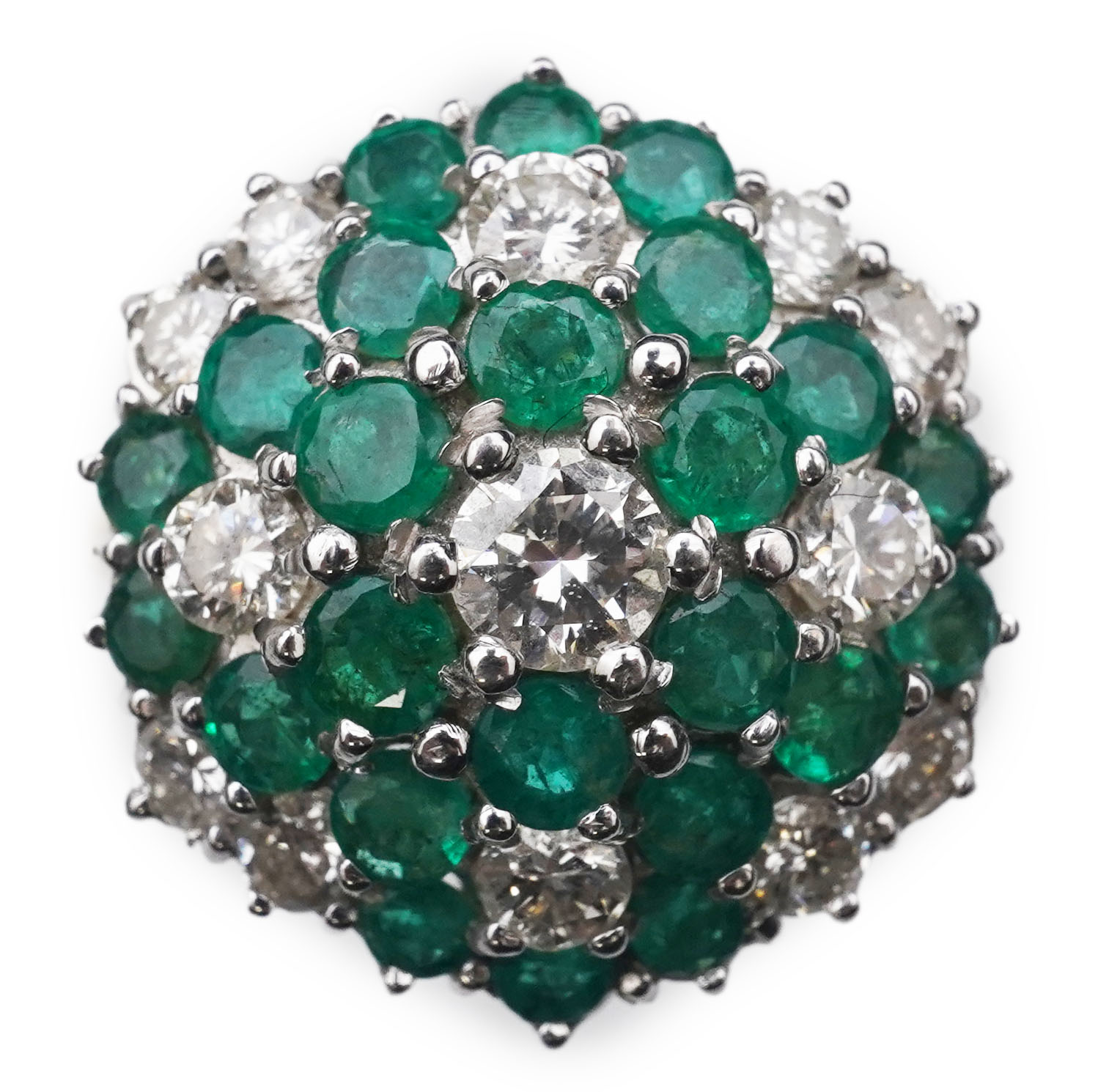 An emerald and diamond cocktail ring